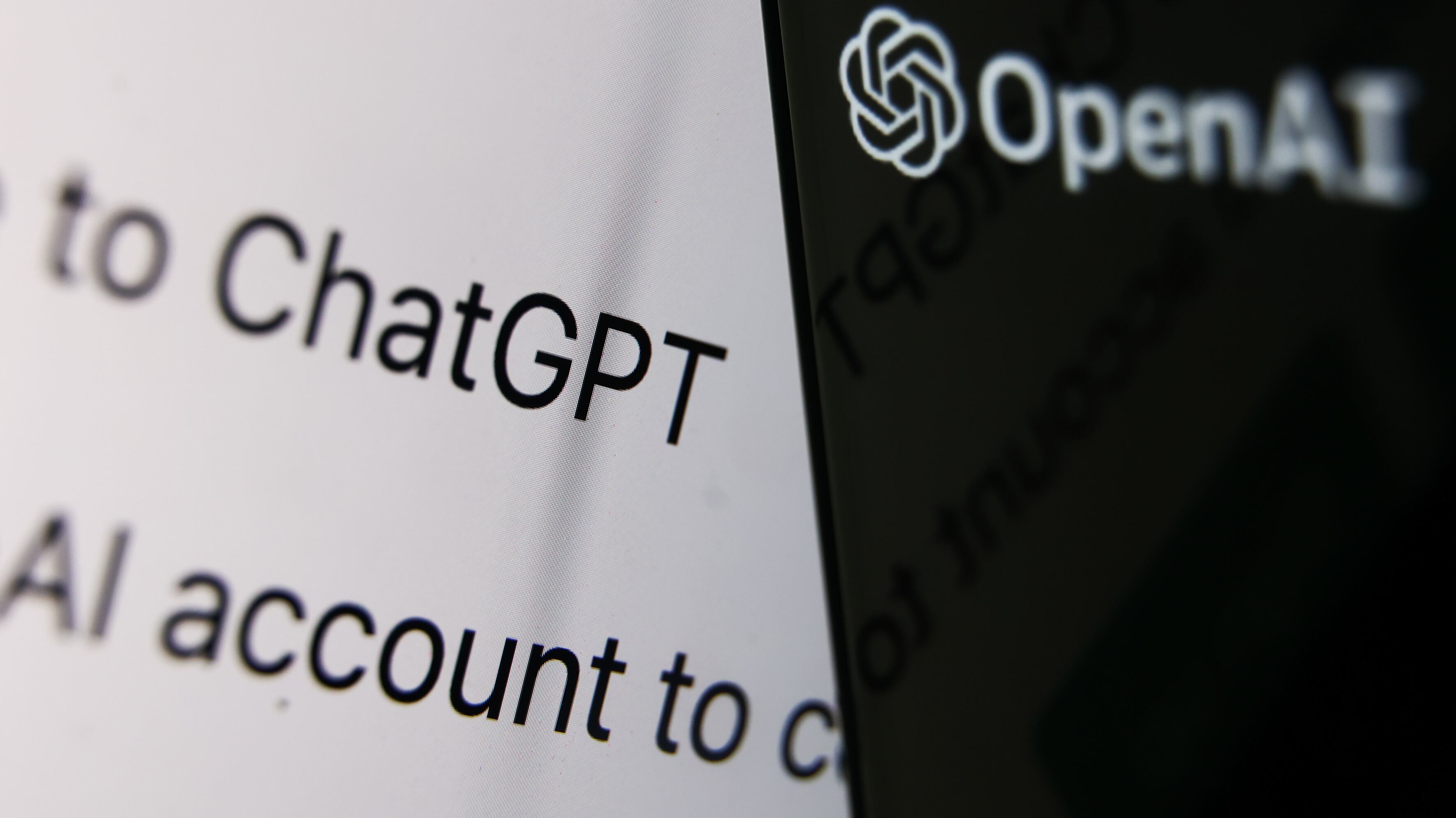 Black and white lettering reading “ChatGPT” and “OpenAI”