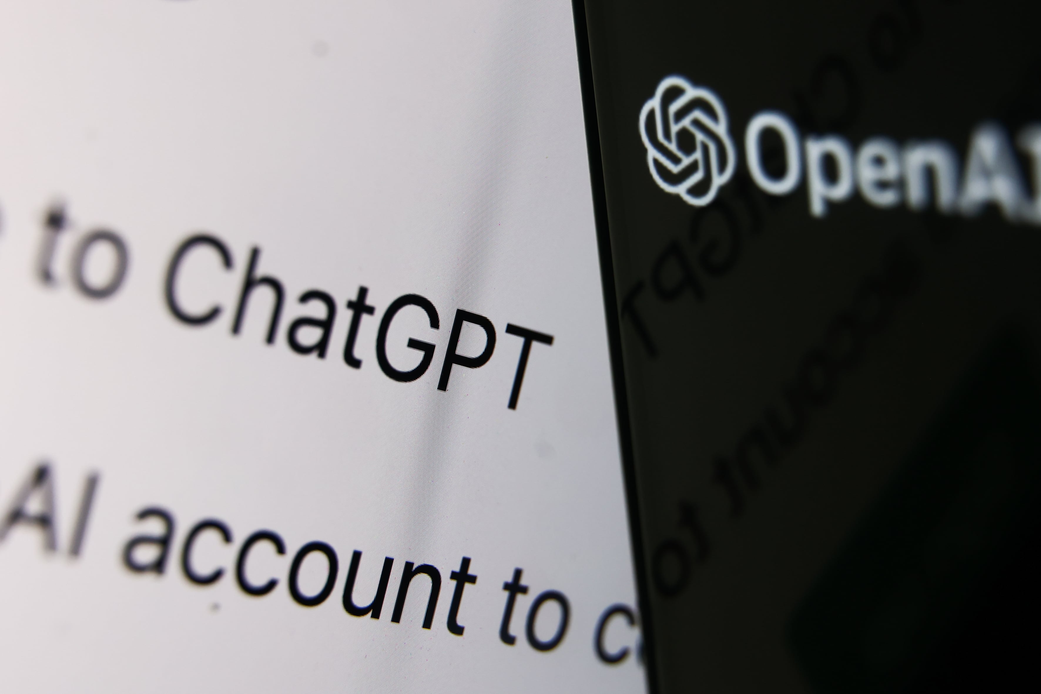 Black and white lettering reading “ChatGPT” and “OpenAI”