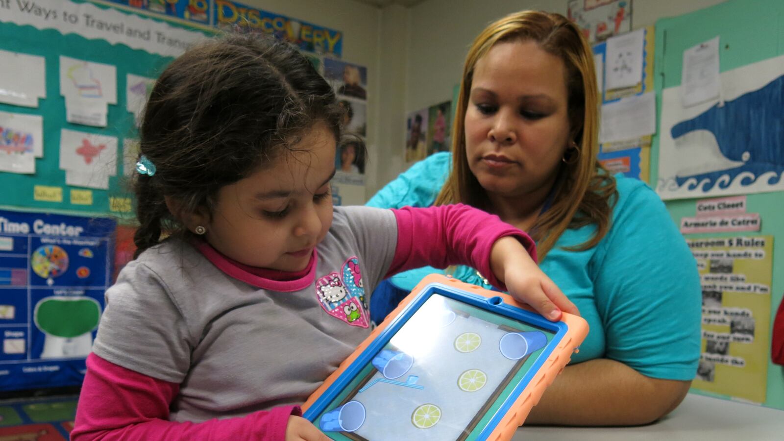 A teaching assistant worked with a pre-K student in East Harlem in 2014.