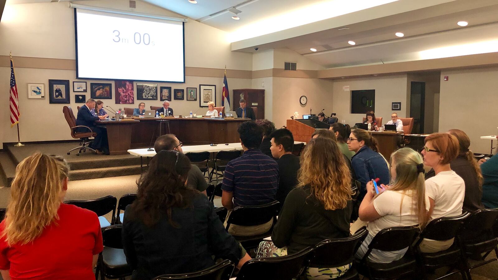 Some teachers, parents, and students wait to speak in favor of updating LGBTQ policies at the Jefferson County School Board meeting Thursday.