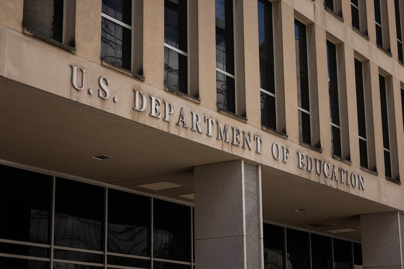 A large stone building with a title that reads "U.S. Department of Education."