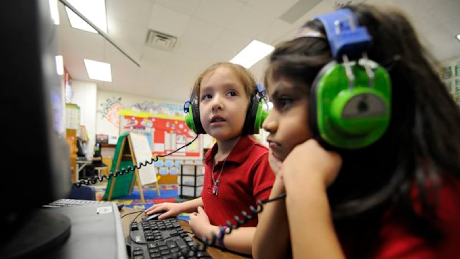 Kindergarteners use computers at IPS School 90.