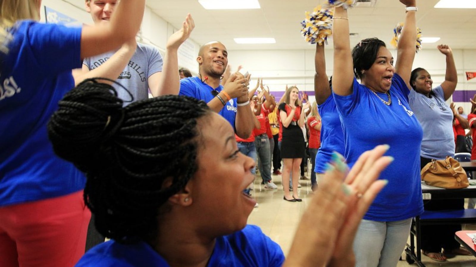 Georgian Hills Achievement Elementary staff celebrate test score results in 2015. The state-run school is now one of four to exit the state's priority list.