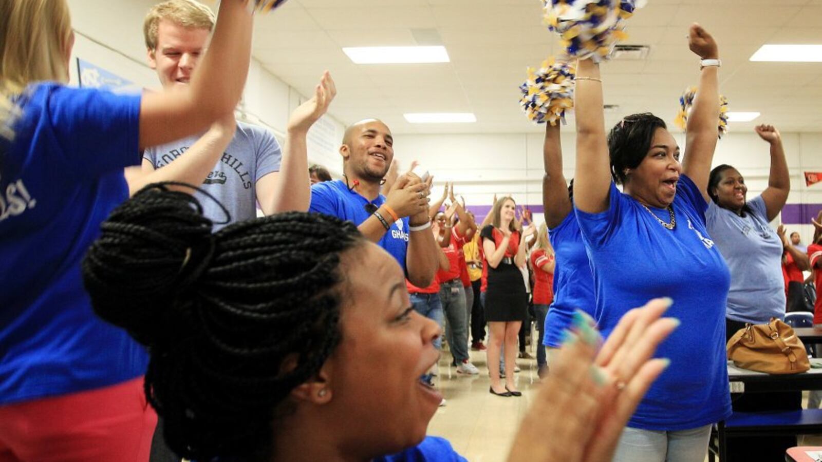 Georgian Hills Achievement Elementary staff celebrate test score results in 2015. The state-run school is now one of four to exit the state's priority list.