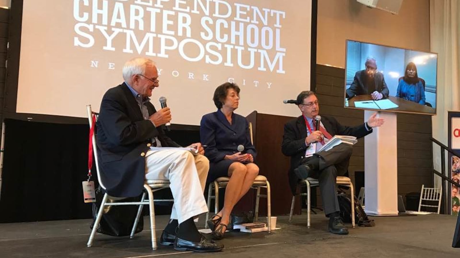 Veter education journalist John Merrow moderates a panel at the Independent Charter School Symposium.