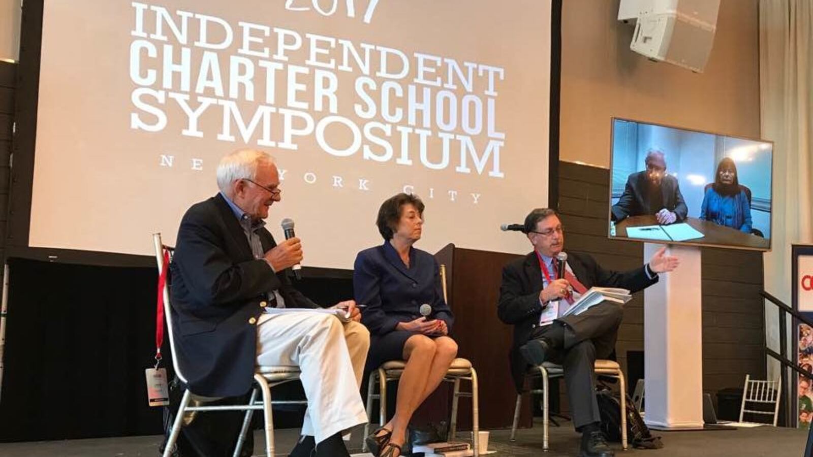 Veter education journalist John Merrow moderates a panel at the Independent Charter School Symposium.