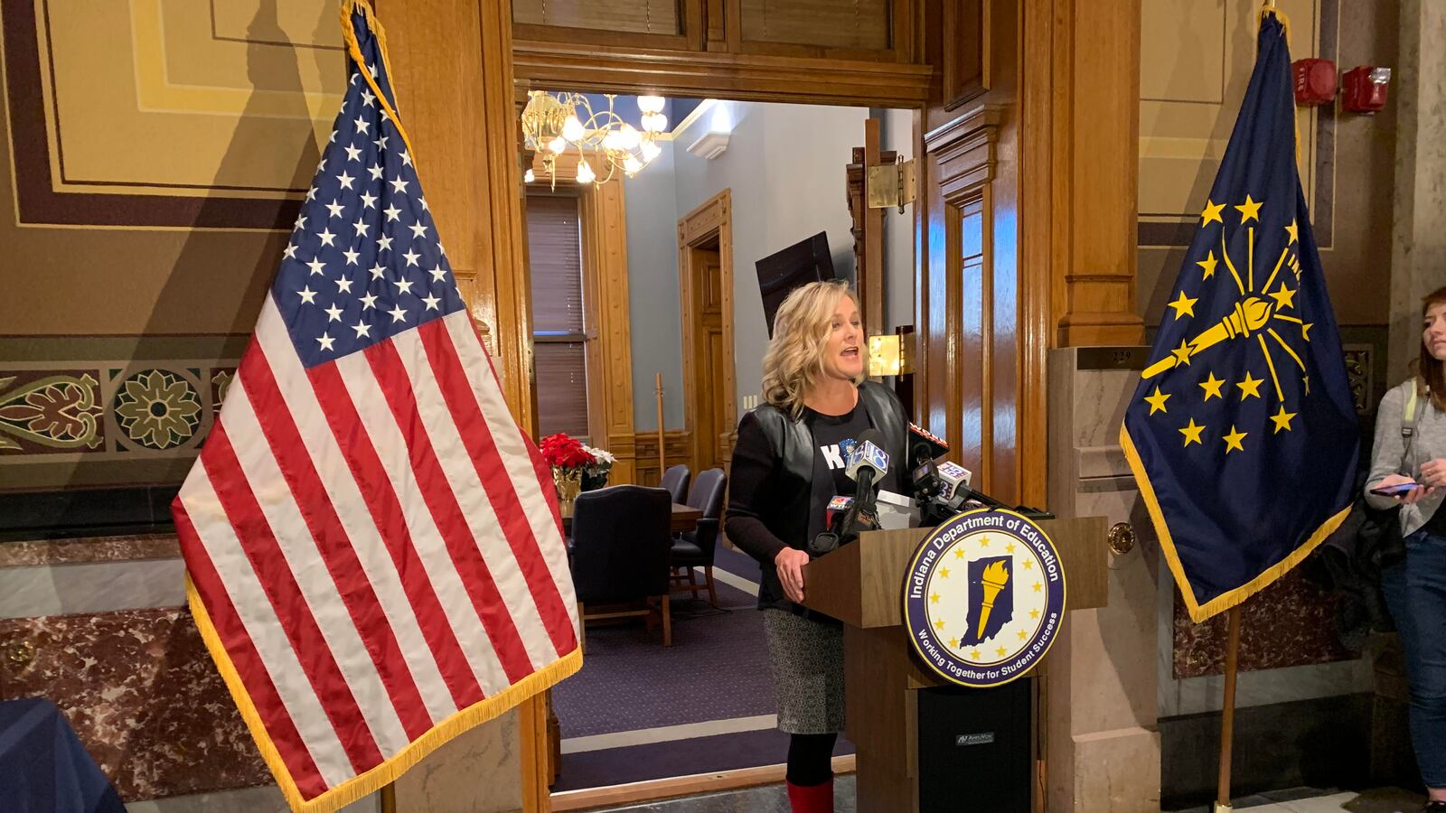 State Superintendent Jennifer McCormick addresses a crowd of Red For Ed rally participants at the Indiana Statehouse on Nov. 19, 2019.