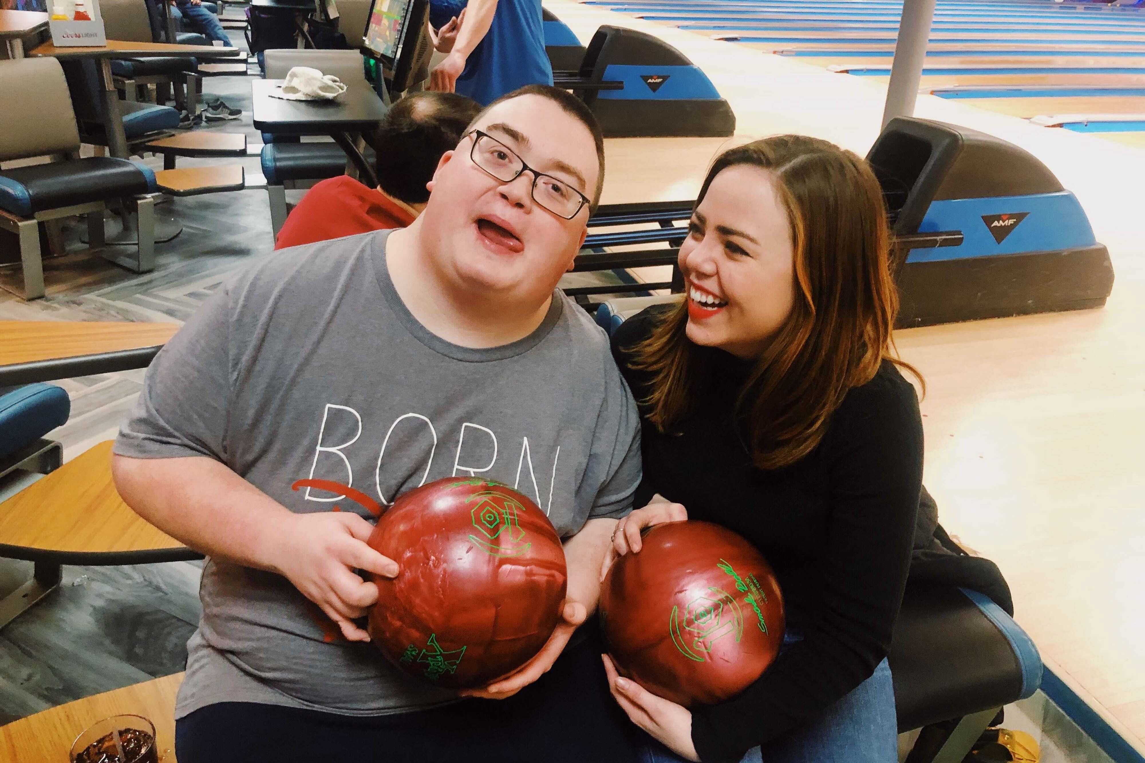 Samantha West, Chalkbeat Tennessee’s new reporter, poses for a photo with her older brother, Alex, while bowling in January 2019.