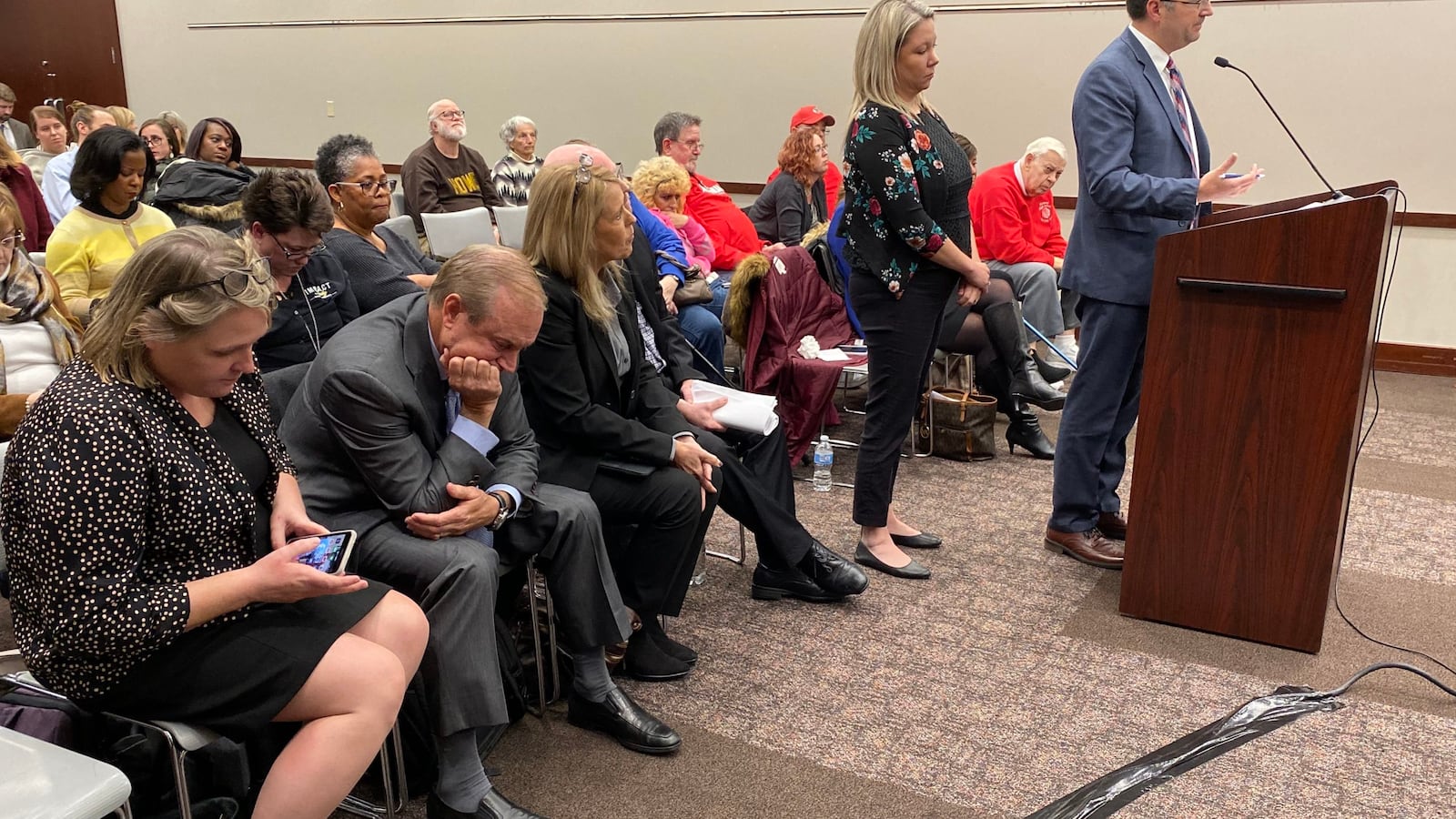 Charter Schools USA CEO Jon Hage, second from left, listens to discussion about the charter application for Howe High School on Friday, Dec. 13, 2019.