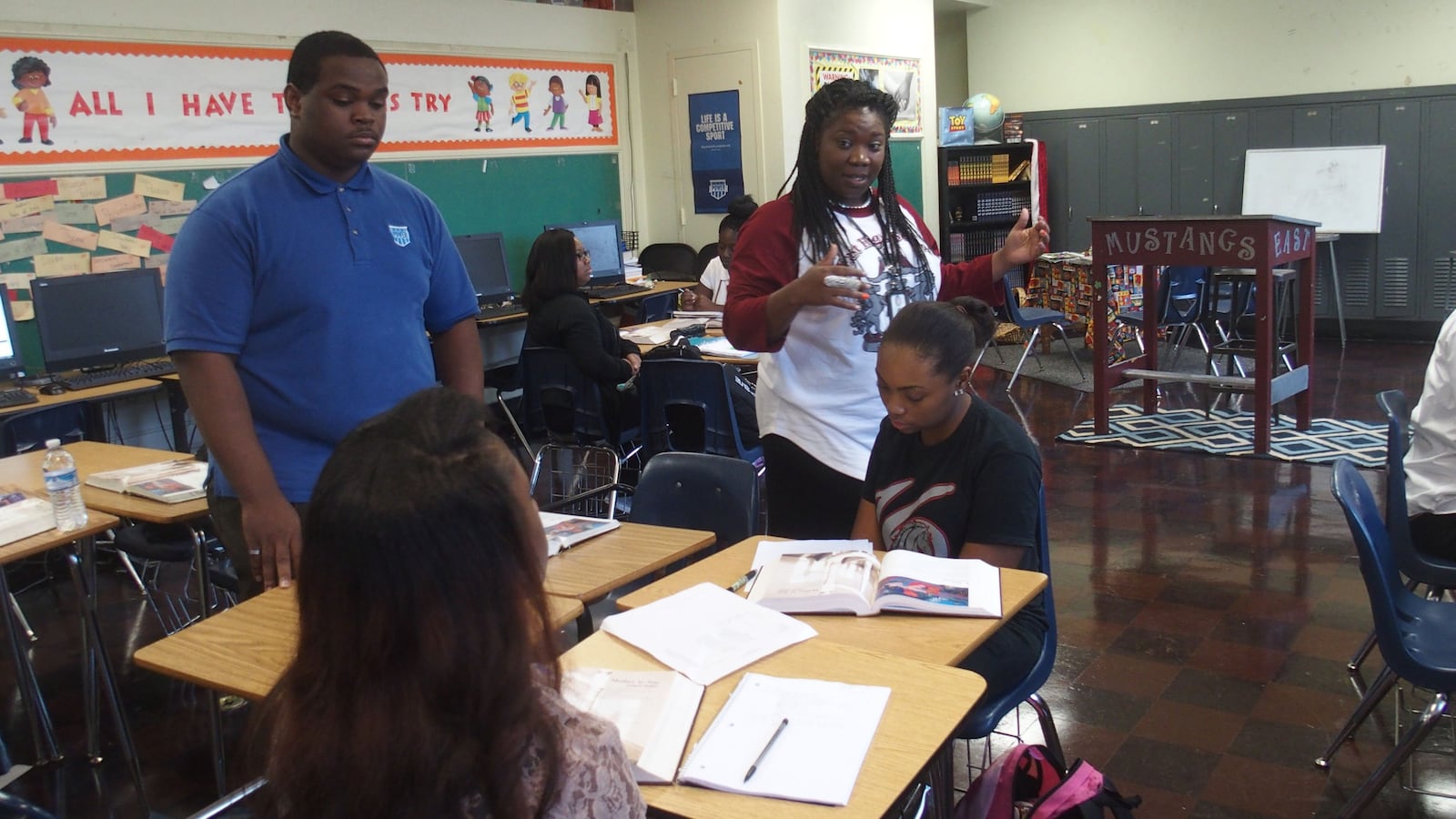 Teacher Meah King (center) introduces curriculum to her students on Monday on the first day of class at East High School in Memphis.