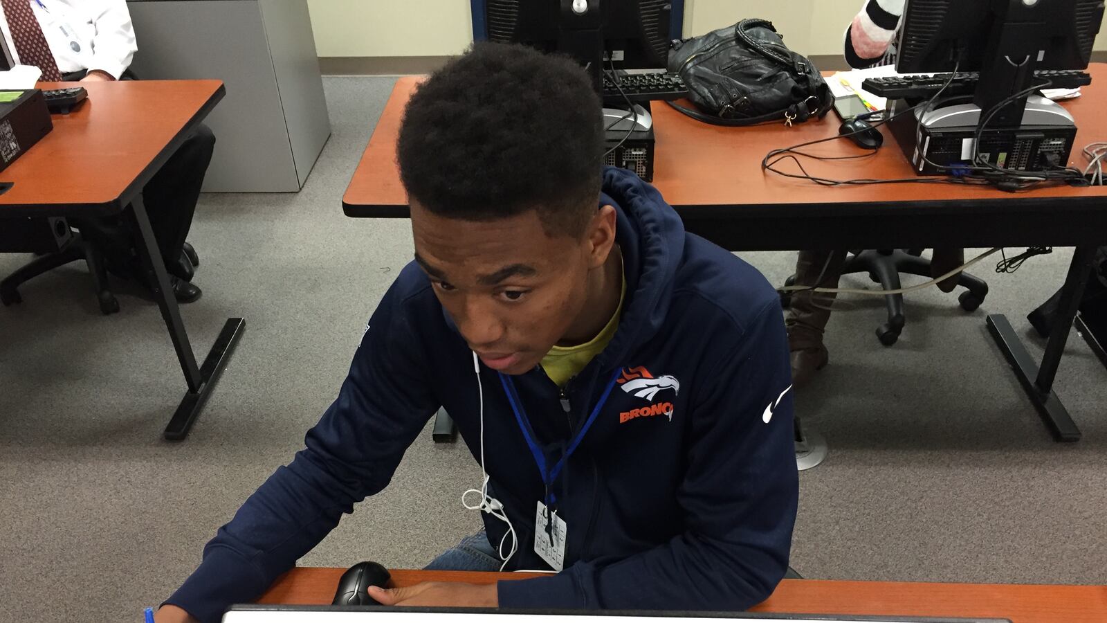 Kennon Baldwin, a Hinkley High School senior, works on an online course during night school.