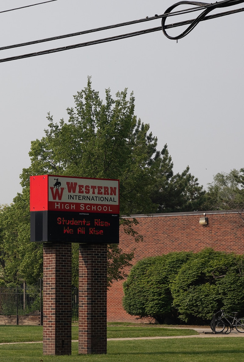 A school sign that reads "Western International High School."