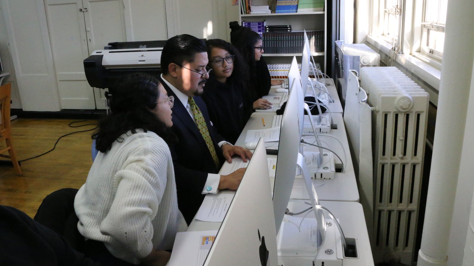 Students at Williamsburg High School of Arts and Technology teach Chancellor Richard Carranza how to code, ahead of an announcement Thursday on an expansion of CTE programs.