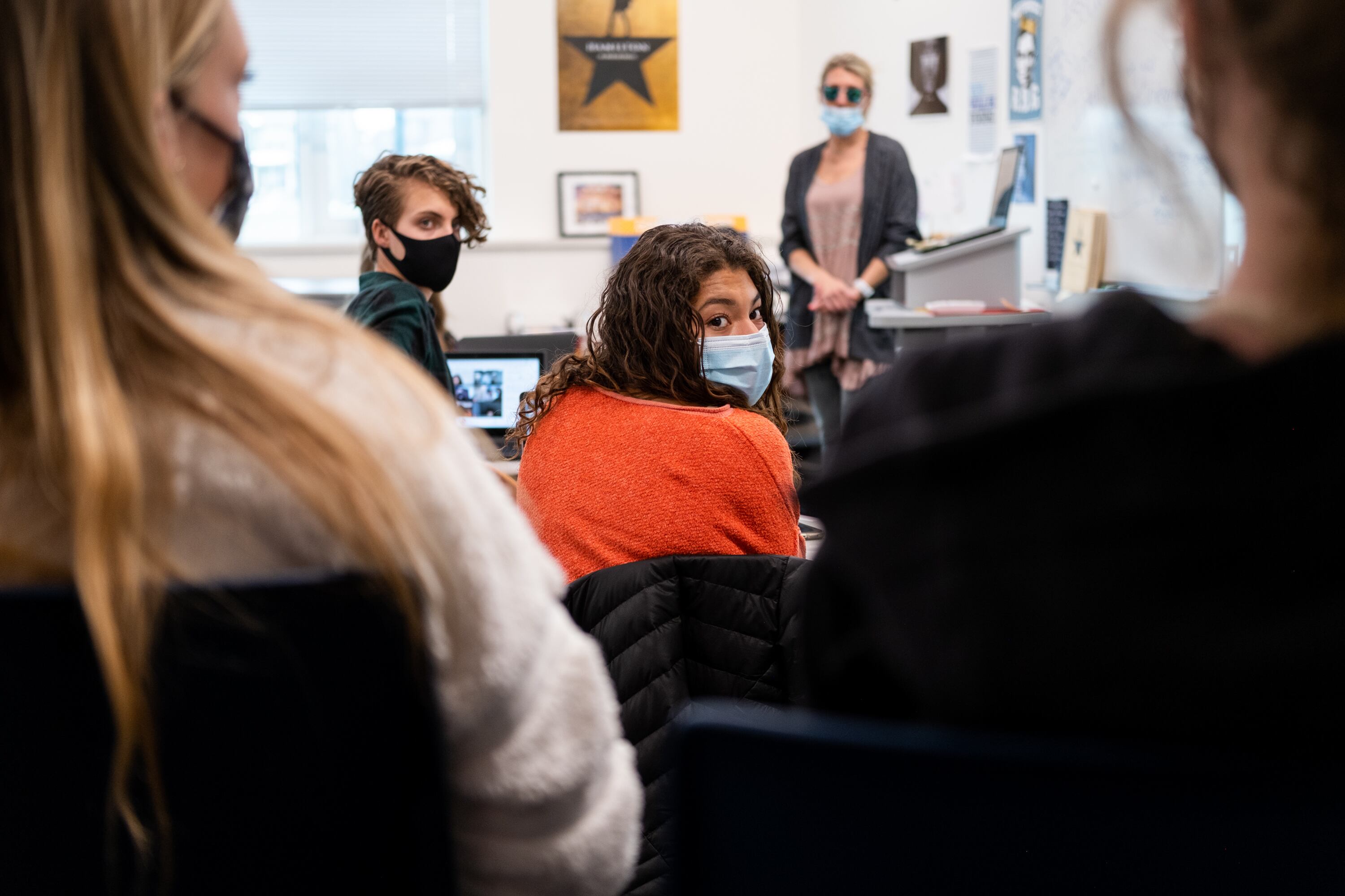 Four students sit in a classroom. Gabriela Kobak, a sophomore, listens to another student during a discussion between student council officers and members at Northfield High School about the recent conviction of former Minneapolis police officer Derek Chauvin for the murder of George Floyd in Denver, Colorado, on Wednesday, April 21, 2021.