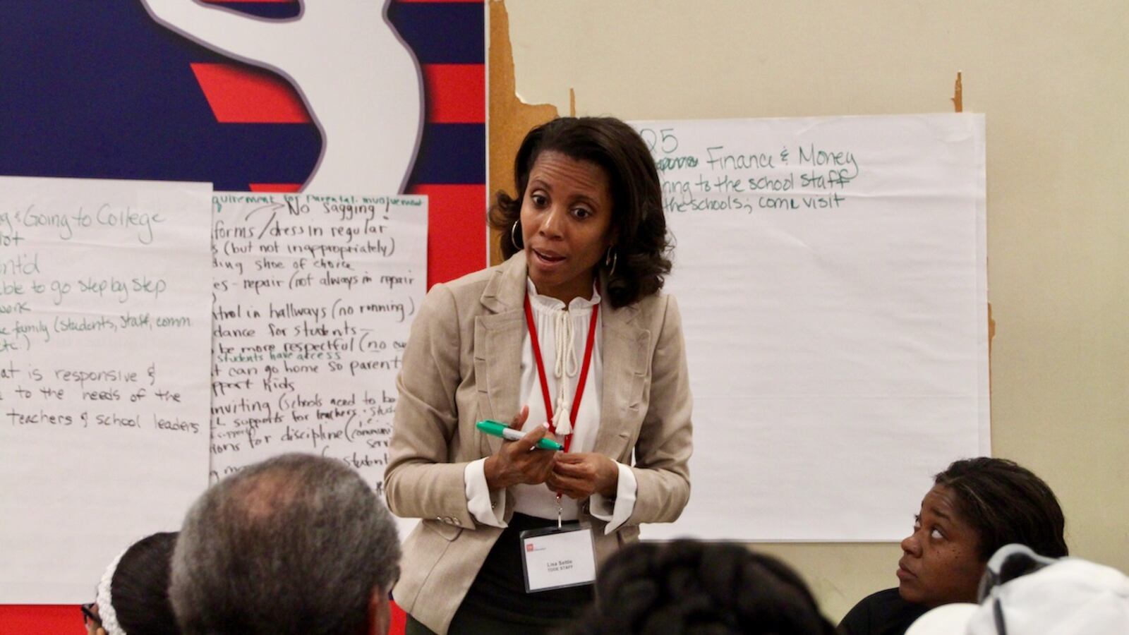 Lisa Settle, an interim superintendent for the Achievement School District, listens during a state-led community meeting in October. This week, the state is releasing a massive proposal out of its listening tour on the future of school turnaround.