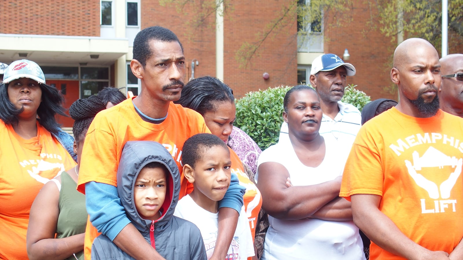 Parents with Memphis Lift rally outside of Northside High School this spring to highlight the impact of school closures.