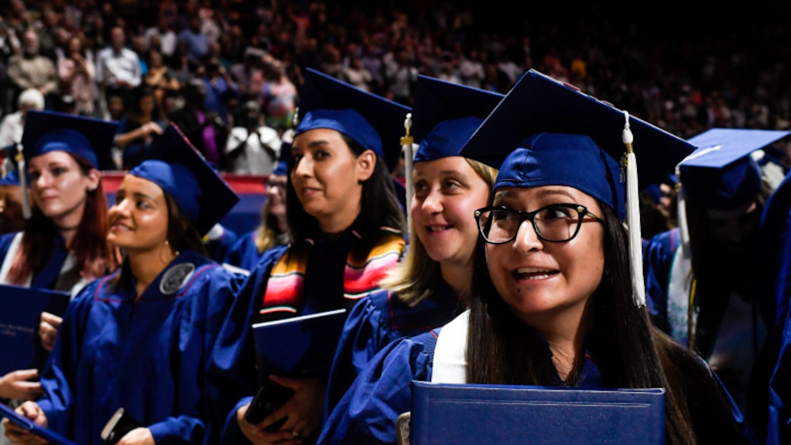 Samantha Kyon (right) smiles during a graduation ceremony at Metropolitan State University of Denver in May 2018.