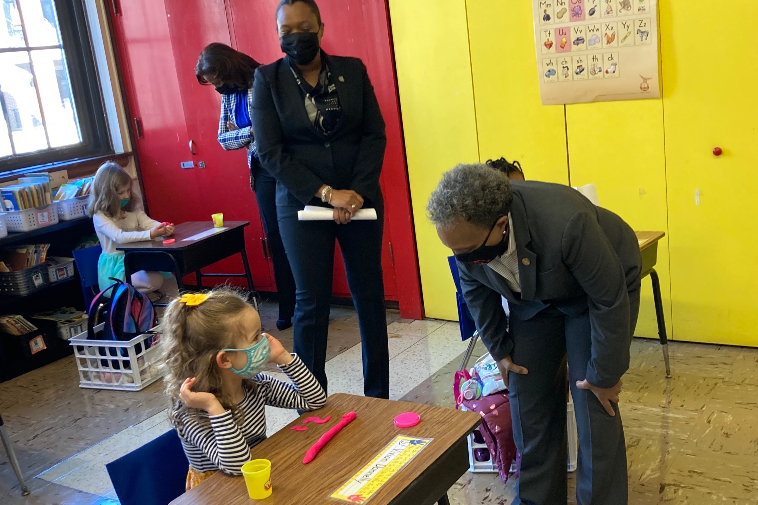 Mayor Lori Lightfoot greets a Chicago student on March 1, 2021.