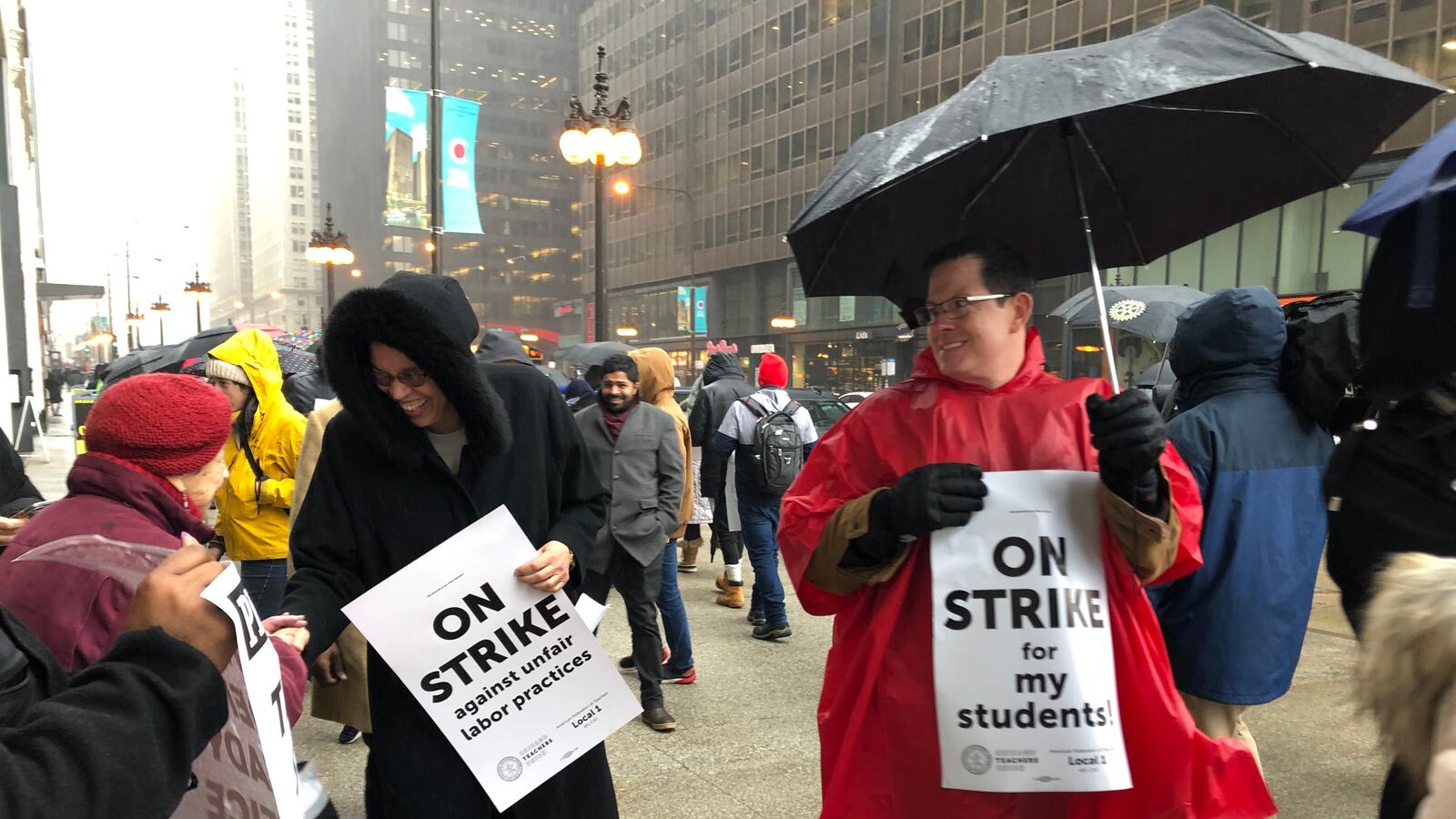 Chicago mayoral candidate Toni Preckwinkle, left, joined striking Chicago International Charter Schools teachers on a picket line at the Illinois Network of Charter Schools on Thursday, Feb. 7, 2019.