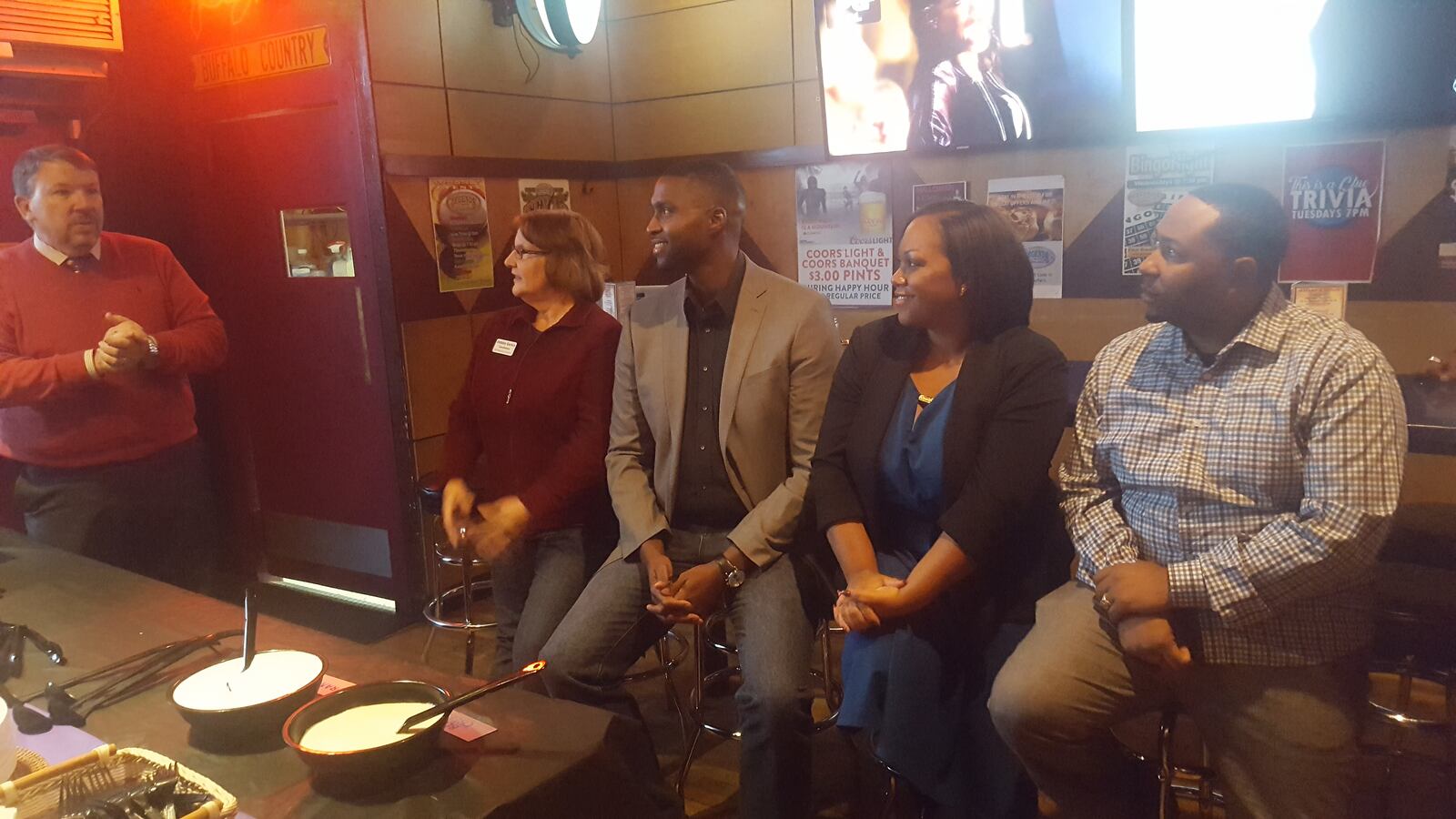 Union President Bruce Wilcox, far left, addressing four school board candidates: Debbie Gerkin, Kevin Cox, Kyla Armstrong-Romero and Marques Ivey, as they awaited election results Tuesday. (Photo by Yesenia Robles, Chalkbeat)