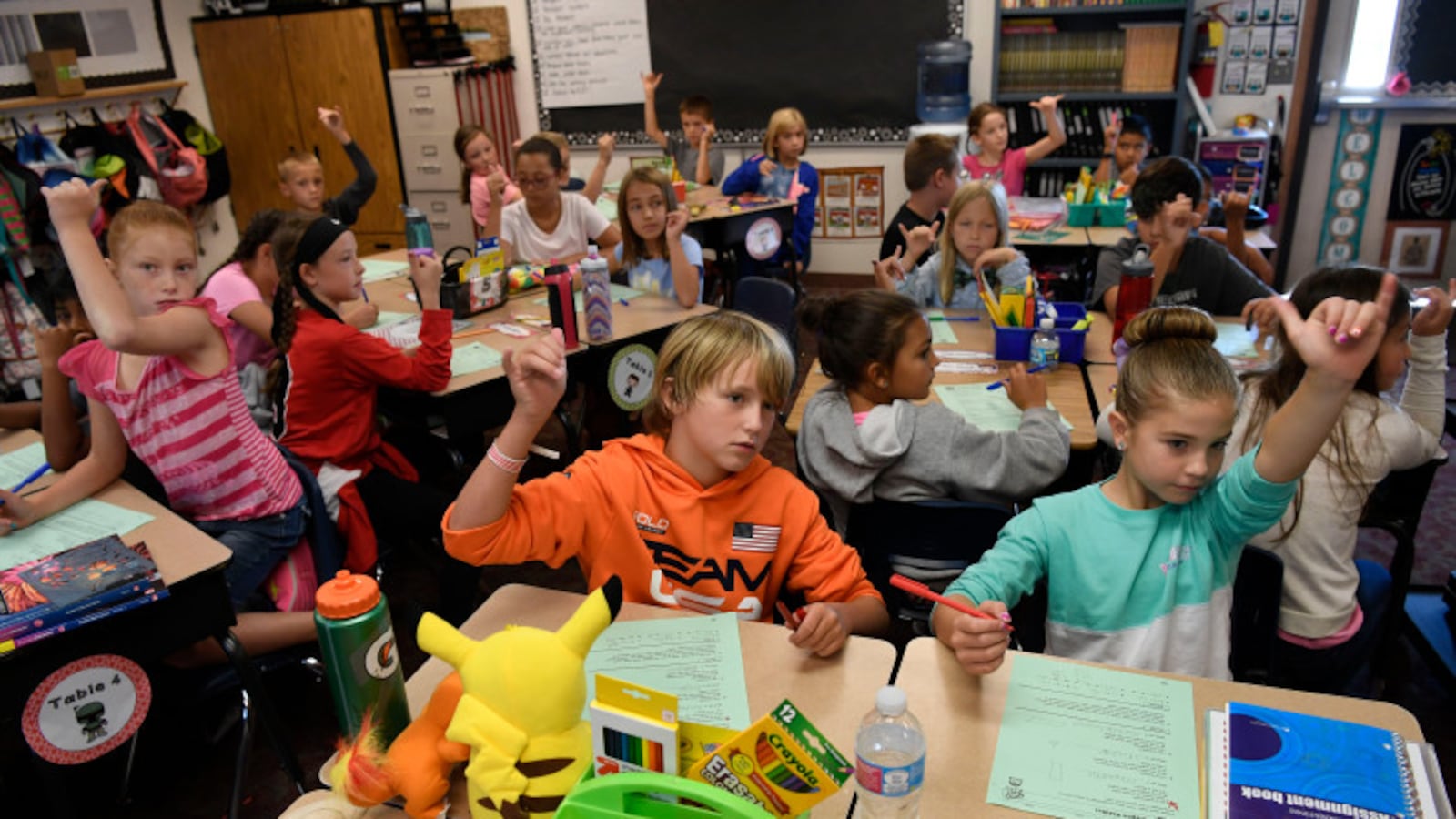 Students pack in Jennifer Hetrick's 4th grade classroom, in a temporary modular “cabin” building at Meridian Elementary in the Adams 12 district. (Photo by Andy Cross/The Denver Post)