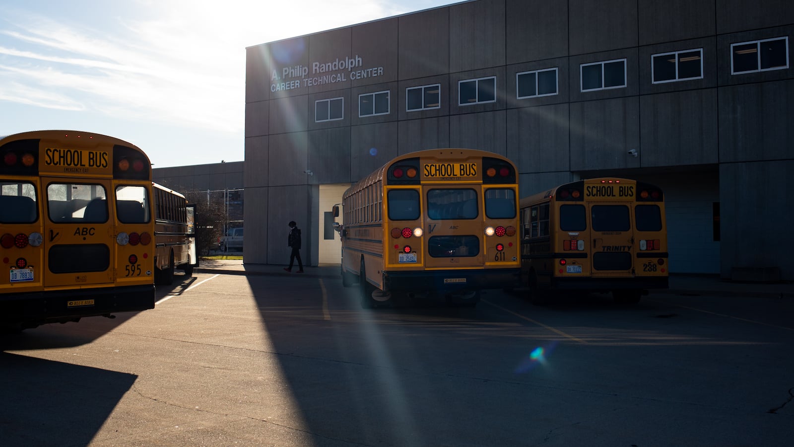 School buses pick up students at the end of the day at Randolph Career and Technical Education in Detroit, Michigan, U.S.,
