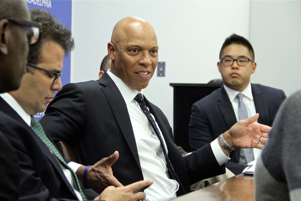 Philadelphia superintendent William Hite in a discussion with other school officials.
