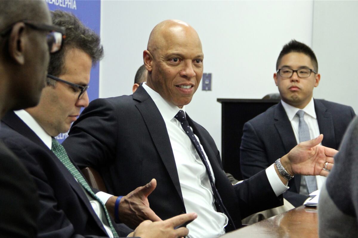 Philadelphia superintendent William Hite in a discussion with other school officials.
