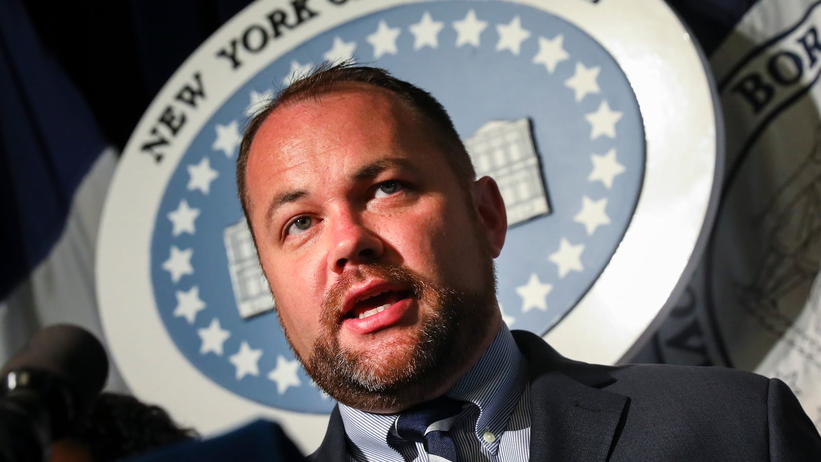 New York City Council Speaker Corey Johnson speaks during a rally last July.