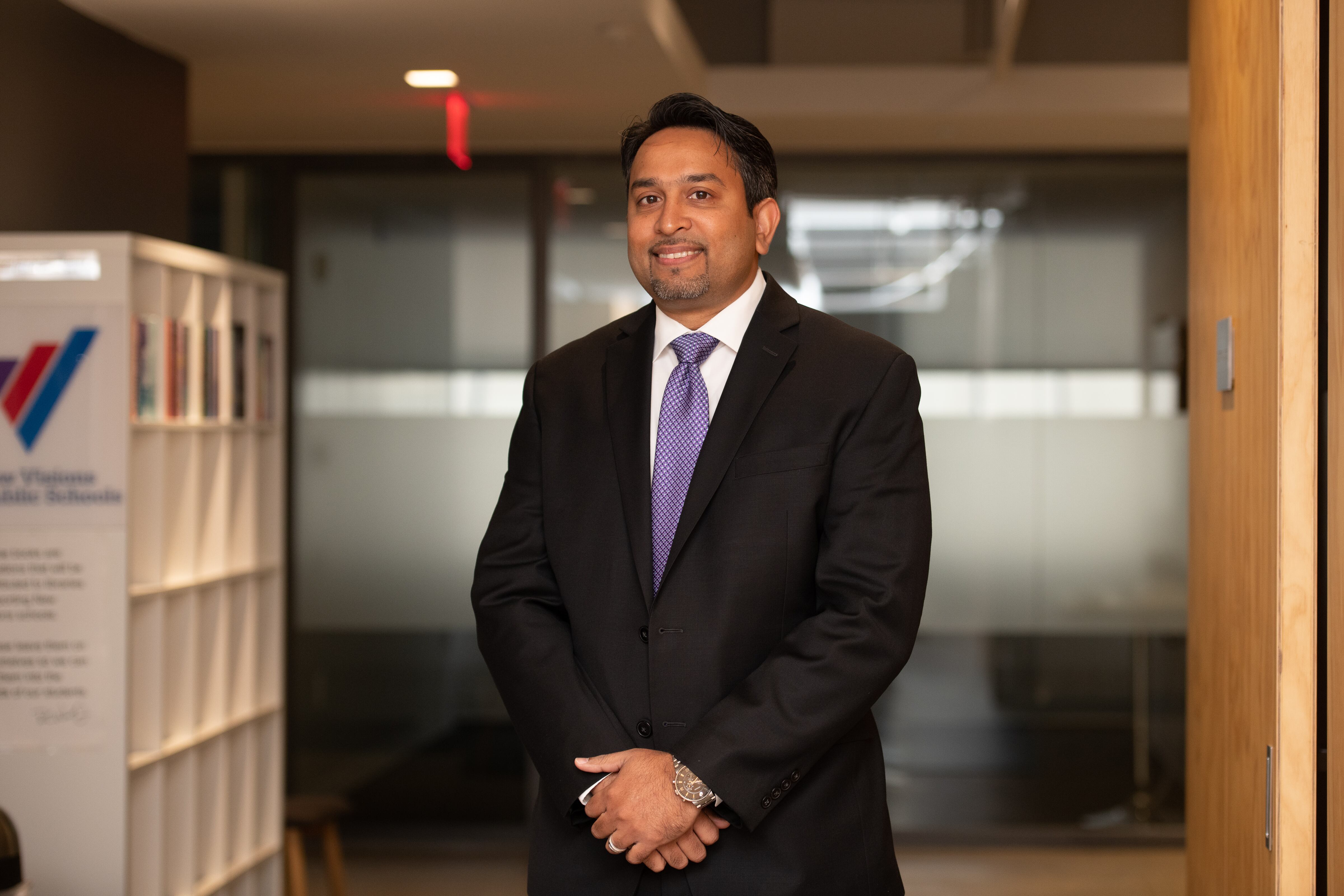 Principal Dyanand Sugrim poses for a photo at Heritage High School.
