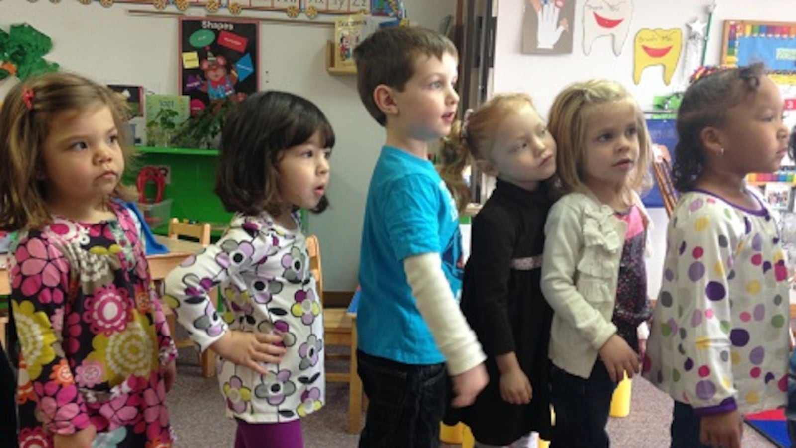 Children in the "3s" class at Promise Christian Preschool in Lafayette line up before circle time.