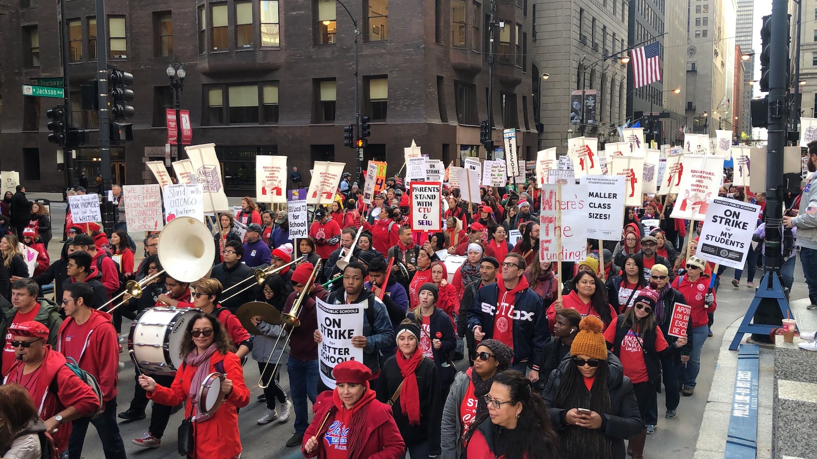 Striking Chicago teachers and supporters march downtown in a rally midday Oct. 17, 2019, to press their demands.