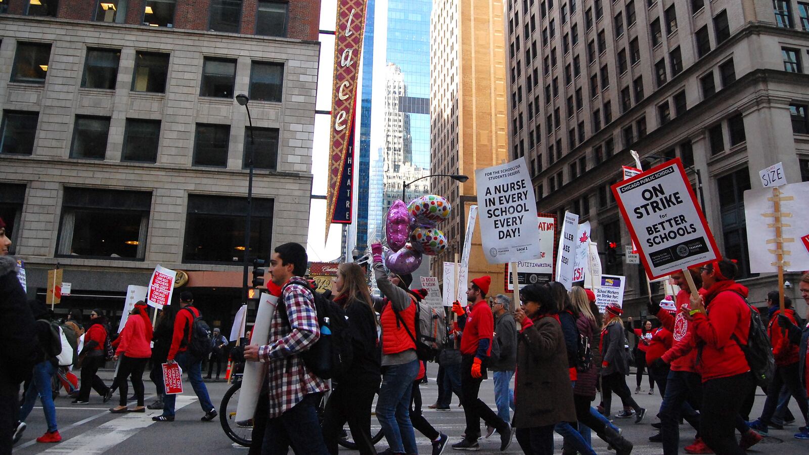 Chicago Teachers Union members rally in downtown Chicago during an 11-day strike.