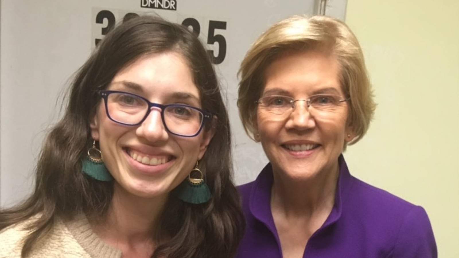 Liat Olenick, left, with Democratic presidential candidate Elizabeth Warren in March. Olenick's advocacy resulted in Warren committing publicly to select a public school educator as U.S. education secretary if elected.