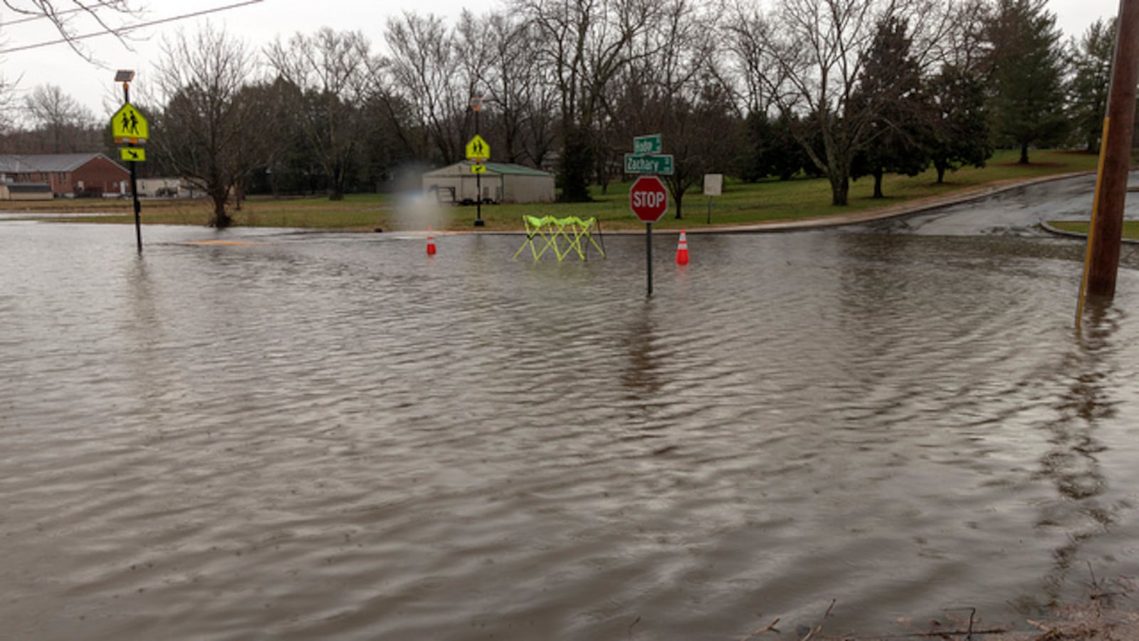Flash floods caused by heavy rains shutter streets in Overton County, home to one of many Tennessee districts that have closed schools in February due to flooding or illness.