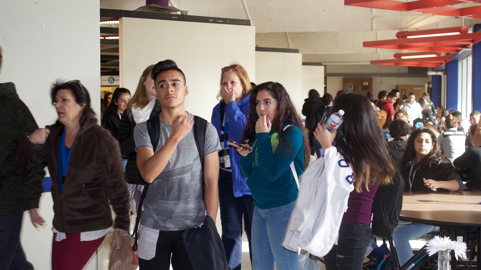 Students move through the crowded cafeteria at Jeffco Public Schools' Alameda International Junior/Senior High School in Lakewood.
