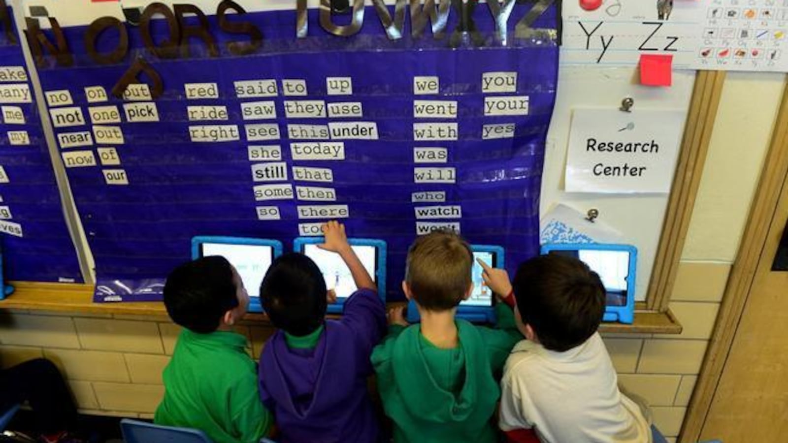 Students work on their iPads at Denver's Ashley Elementary school in 2015.
