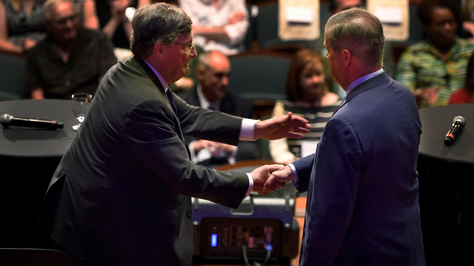 House Minority Leader Craig Fitzhugh shakes hands with former Nashville Mayor Karl Dean, right, after the Tennessee Democratic gubernatorial debate on June 19 at Belmont University in Nashville.