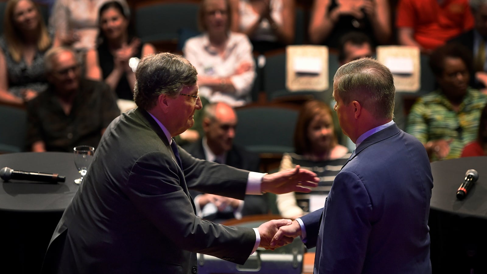House Minority Leader Craig Fitzhugh shakes hands with former Nashville Mayor Karl Dean, right, after the Tennessee Democratic gubernatorial debate on June 19 at Belmont University in Nashville.