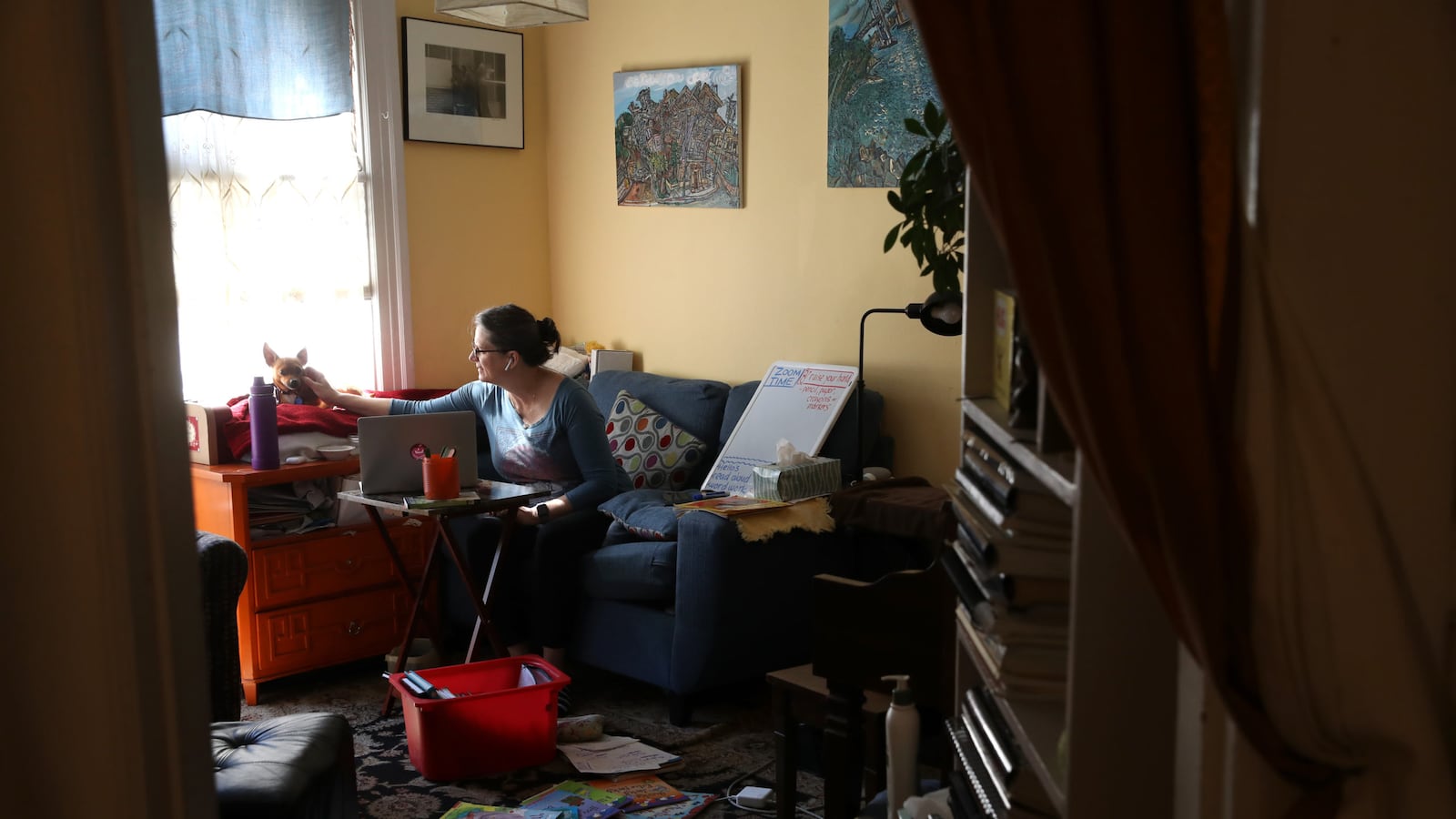Leanne Francis, first grade teacher at Harvey Milk Civil Rights Academy, conducts an online class from her living room in San Francisco, California. With schools closed across the United States due to the COVID19 pandemic, teachers are holding some classes for students online.
