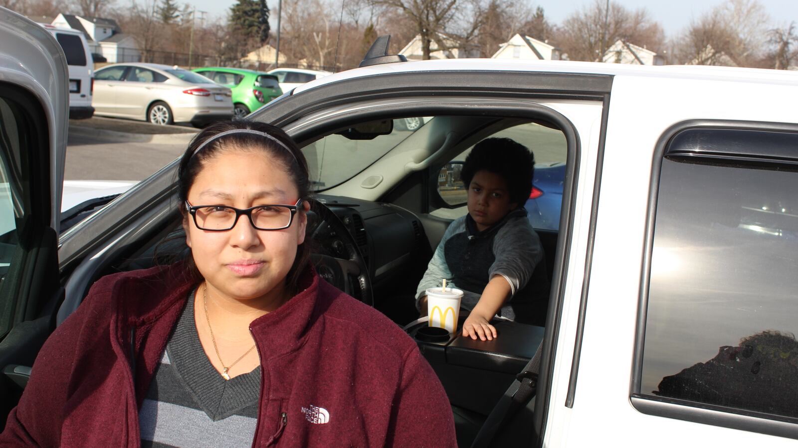 Michelle Villa stands in the parking lot of the Southwest Detroit Community School before a school board meeting last week.