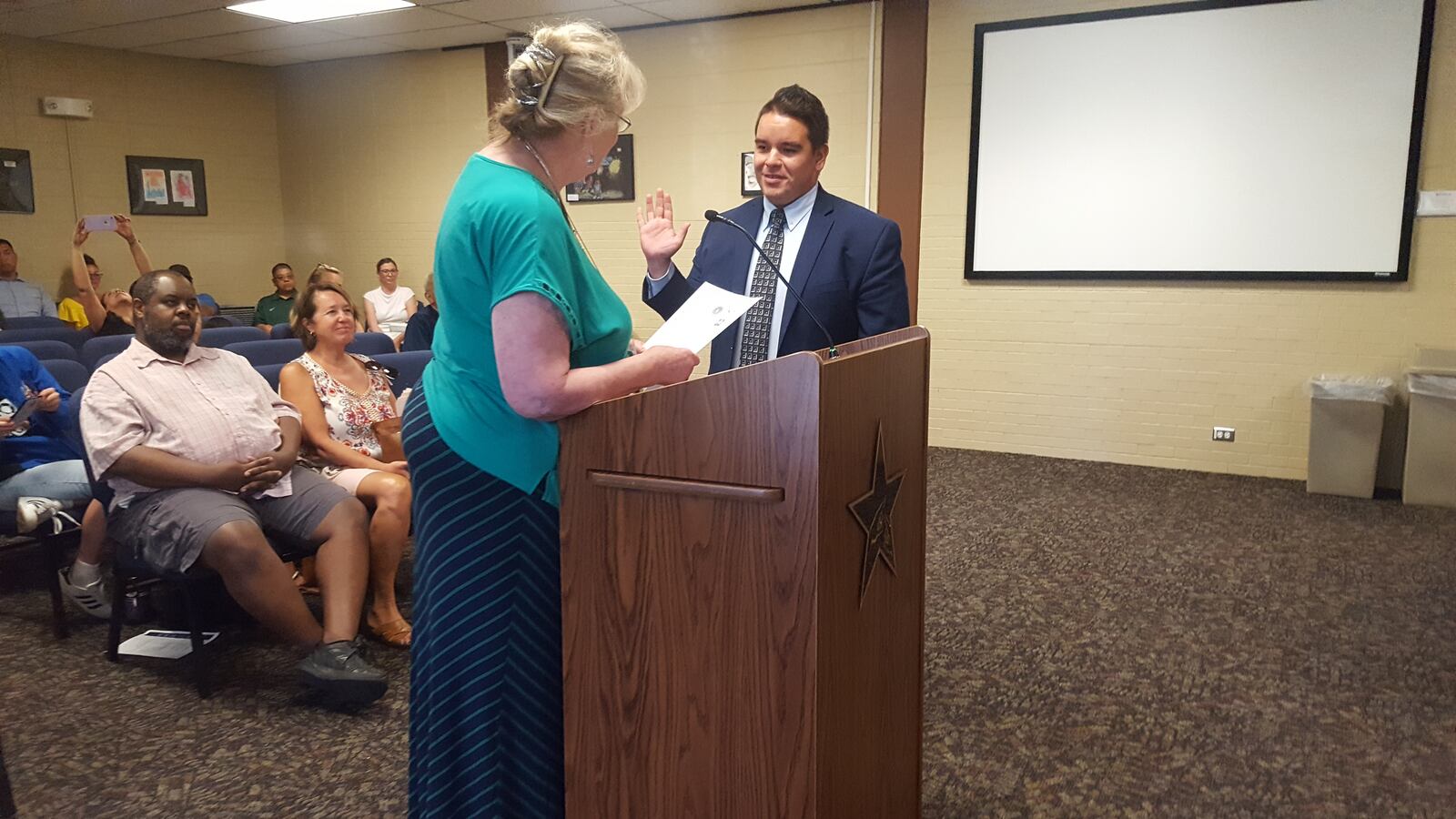 State Sen. Dominick Moreno being sworn in Monday evening.  (Photo by Yesenia Robles, Chalkbeat)