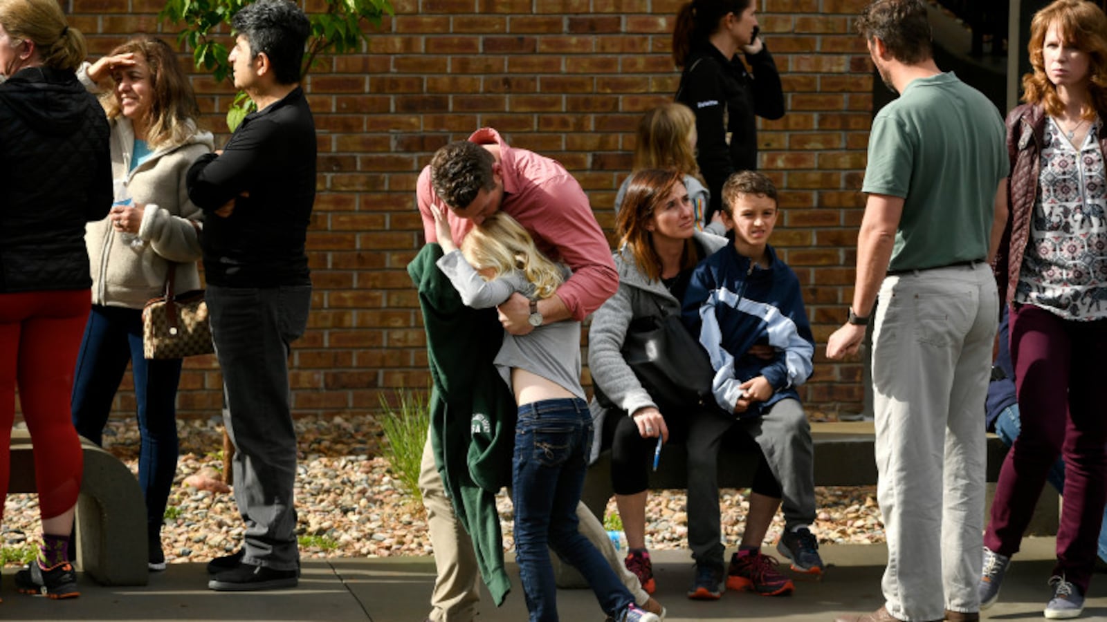 Parents pick up their kids from the Highlands Ranch Recreation Center at Northridge after a shooting at a Douglas County school.