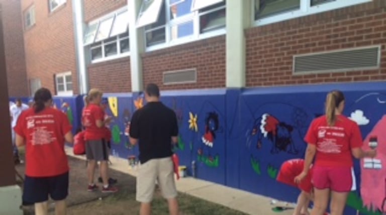 Educators, leaders join forces to spruce up two local schools