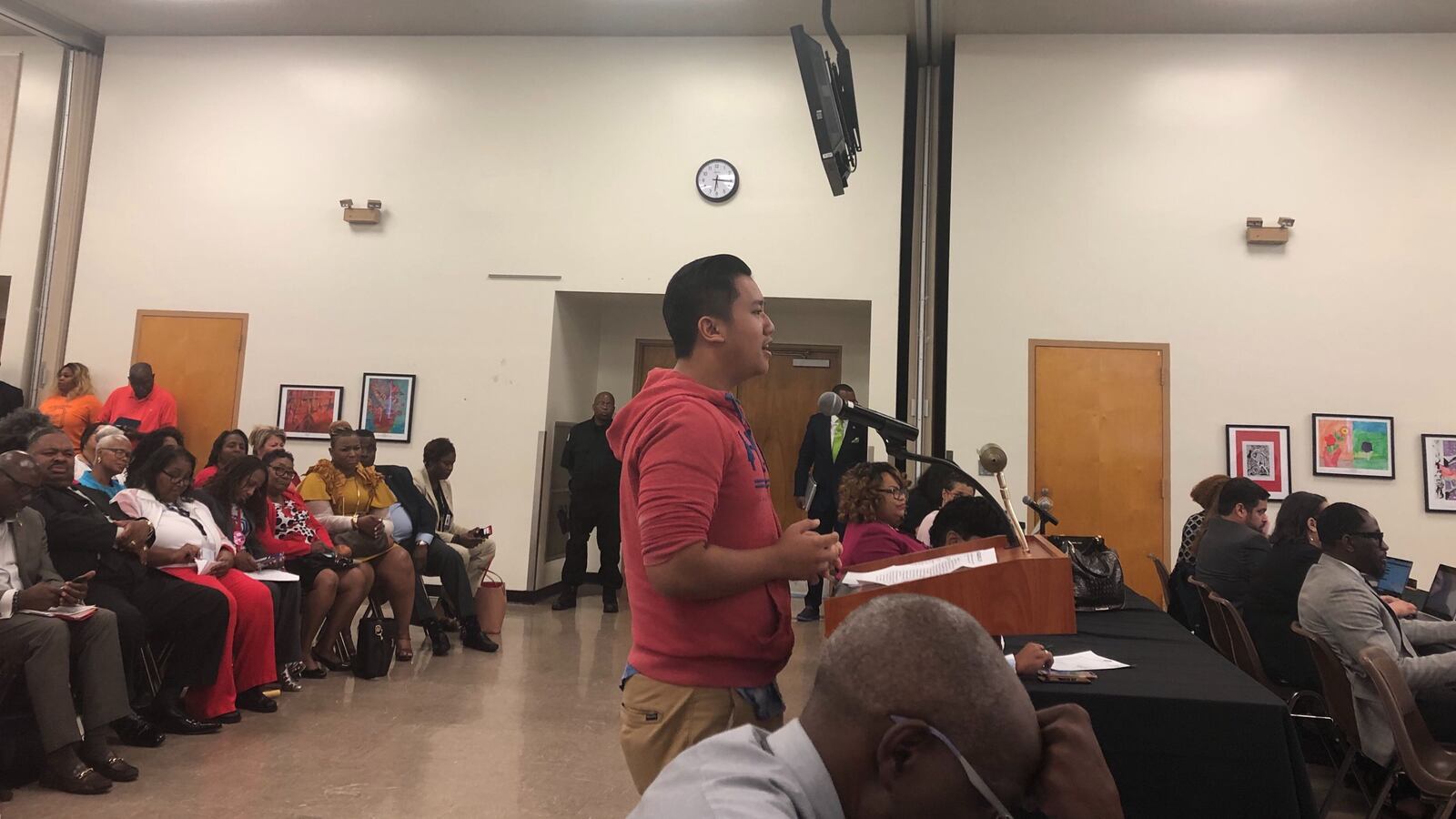 Trumg Lee, an 11th-grader at Southwest Early College High School was among those who spoke at the evening board meeting.