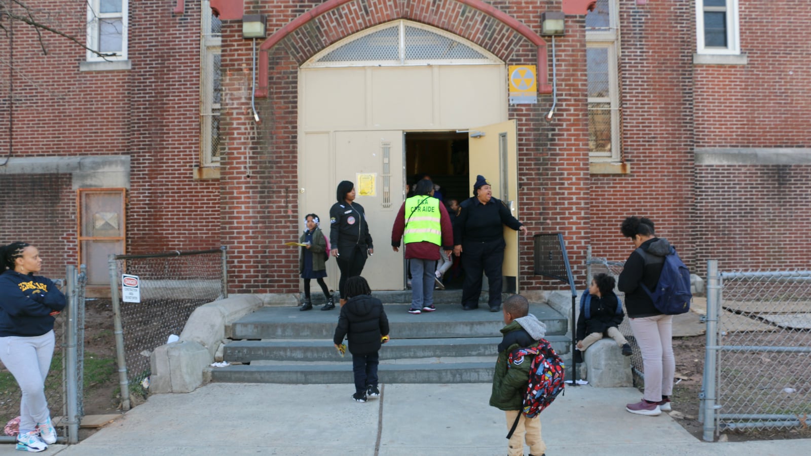Students, caregivers, and school staff outside of Hawthorne Avenue Elementary school.