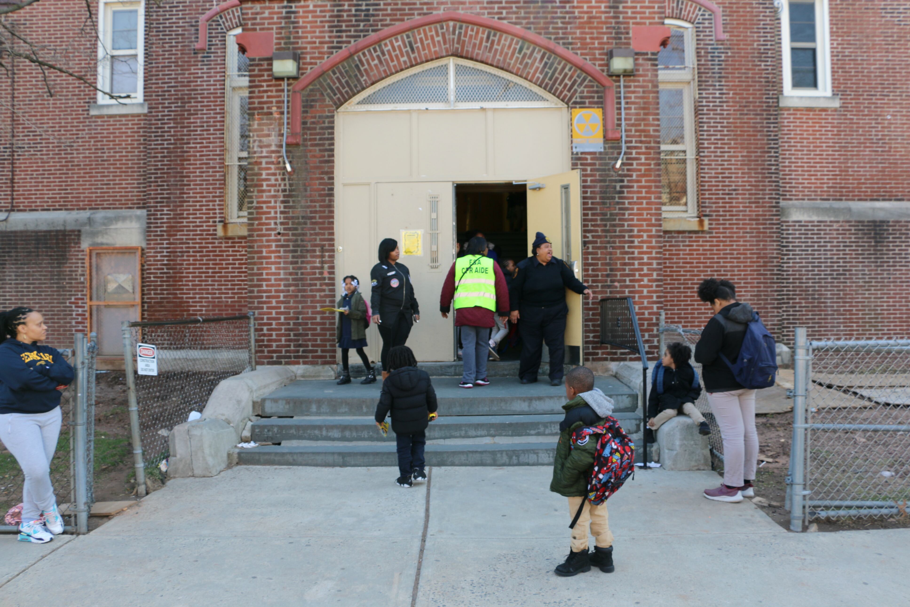Students, caregivers, and school staff outside of Hawthorne Avenue Elementary school.