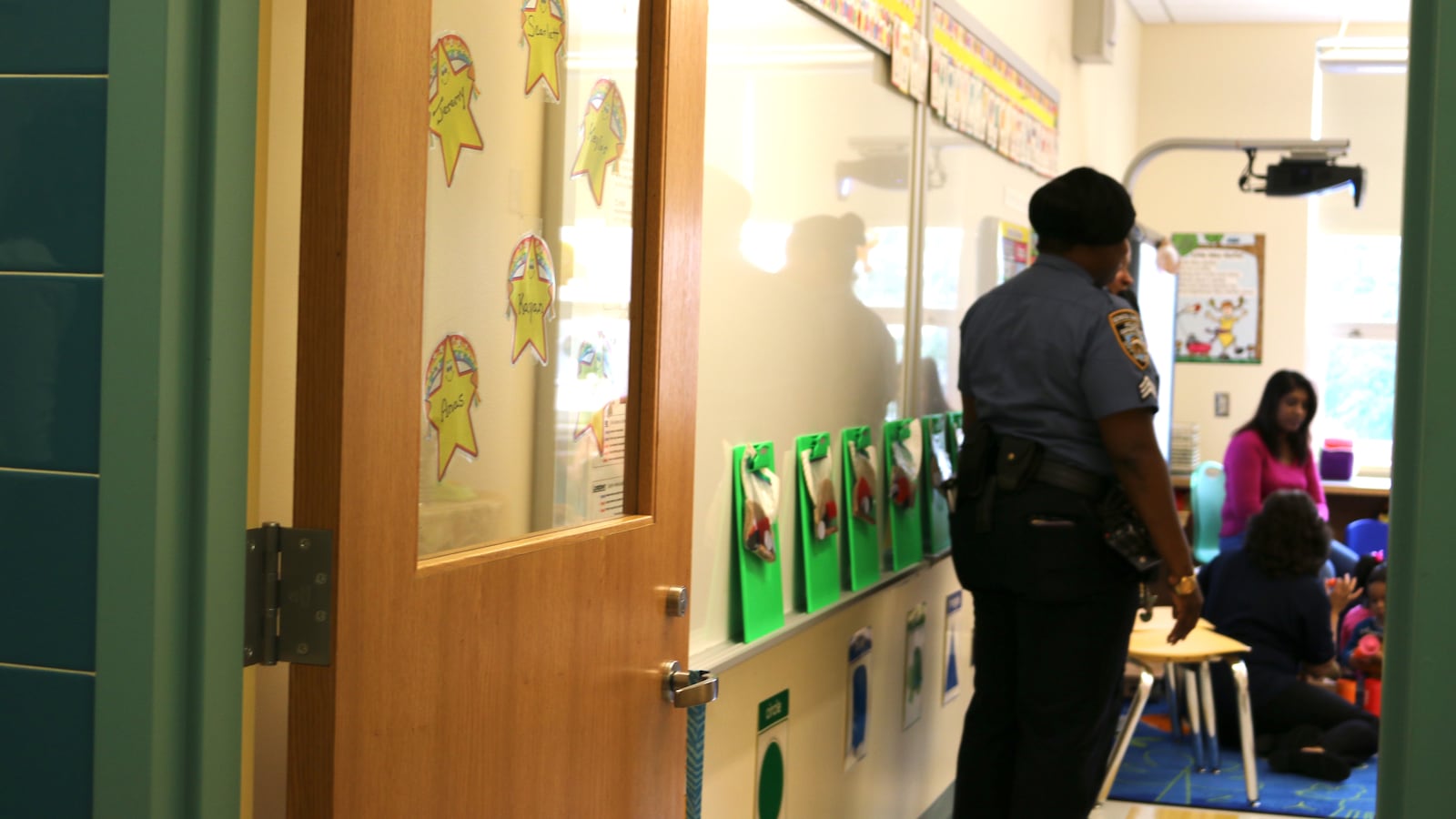 A member of the New York Police Department visits a classroom at Queens Explorers Elementary School.