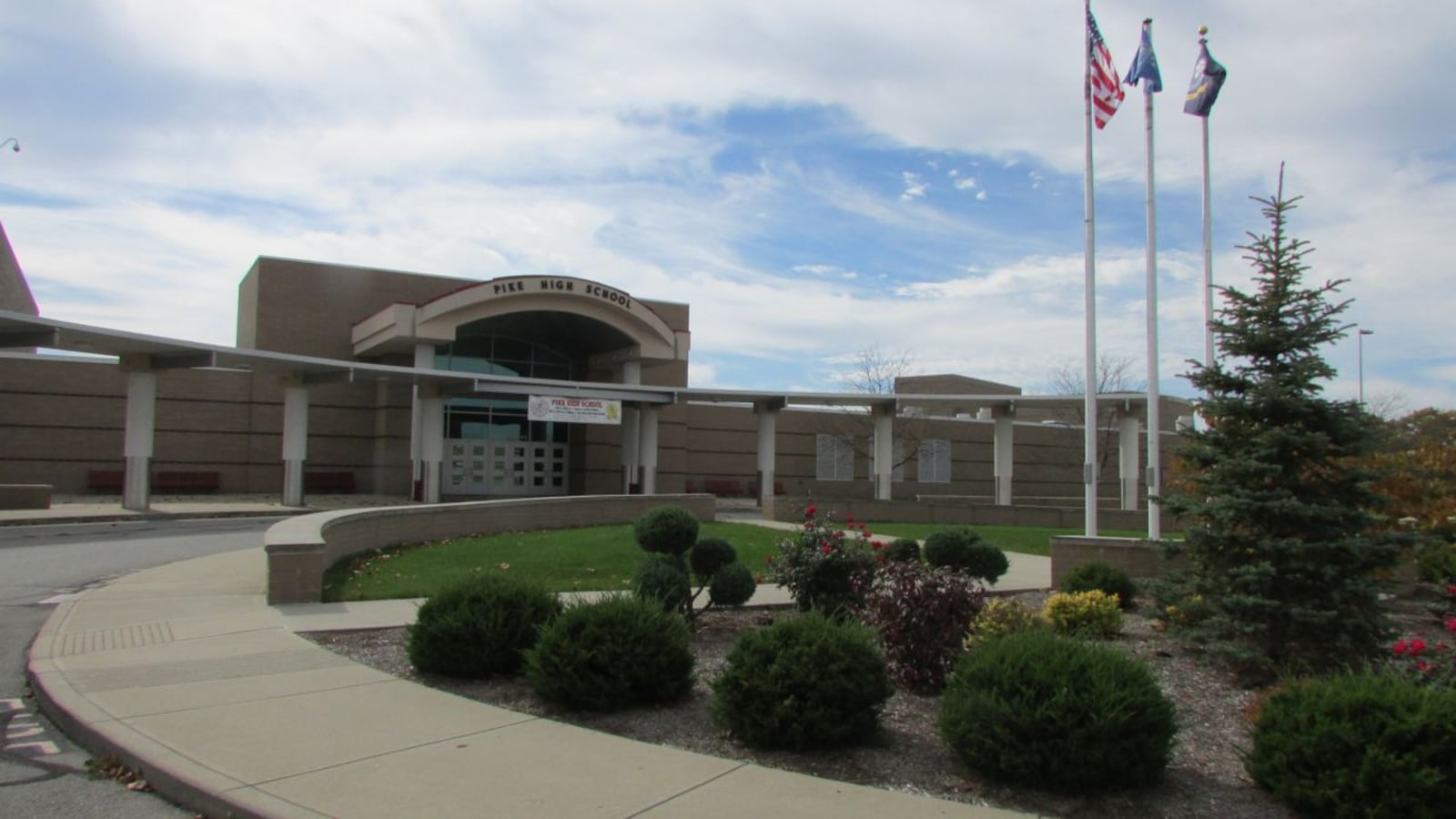Pike High School has raised its state report card grade to a B from a D over four years.