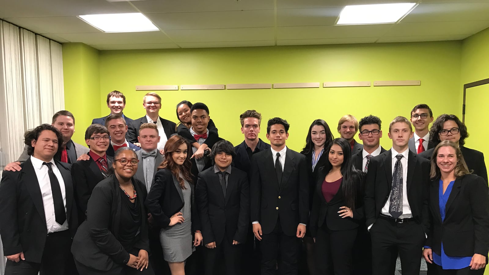 Victoria Bull, in the first row on the far right, is a civics teacher at Northglenn High School.